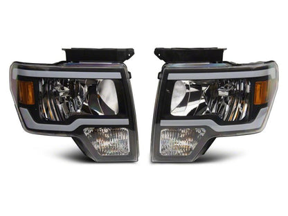 Raxiom 09-14 Ford F-150 Axial Series Headlight w/ SEQL LED Bar- Black Housing (Clear Lens)