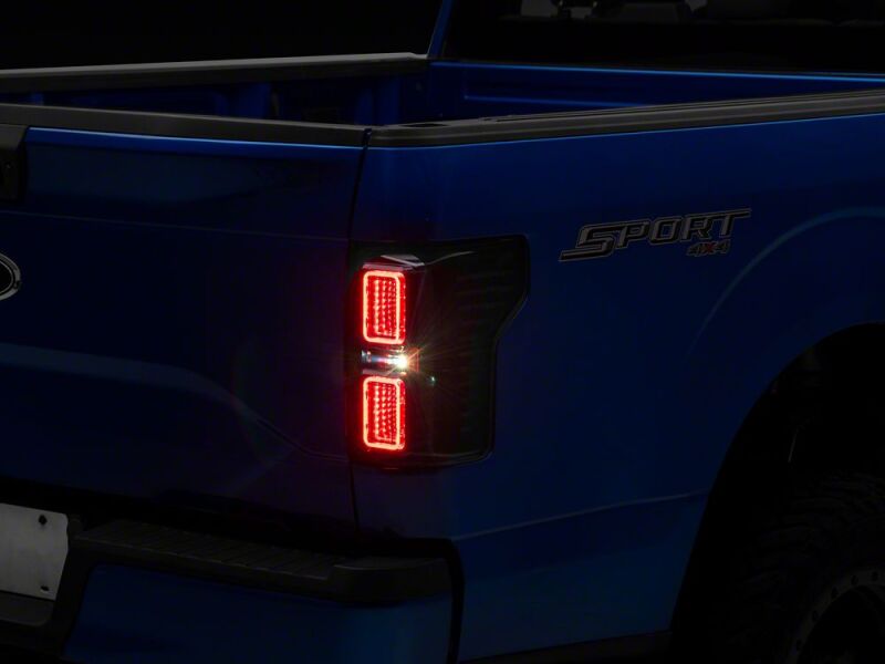Raxiom 15-17 Ford F-150 CXR Series LED Tail Lights- Black Housing- Smoked Lens