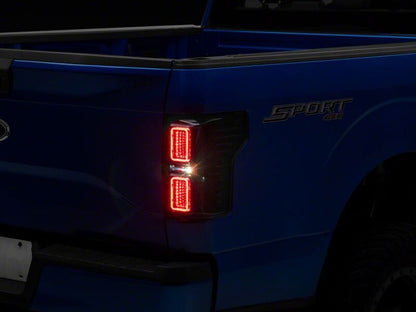 Raxiom 15-17 Ford F-150 CXR Series LED Tail Lights- Black Housing- Smoked Lens