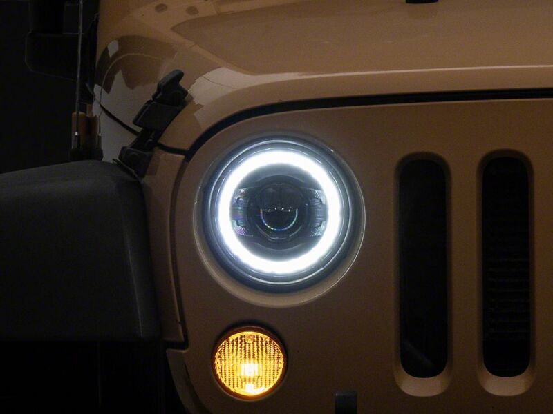 Raxiom 07-18 Jeep Wrangler JK 7-Inch V2 Dragon Eye LED Headlights- Black Housing- Clear Lens