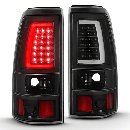 Raxiom 03-06 Chevrolet Silverado 1500 Fleetside Axial Series LED Tail Lights- Black - Clear Lens