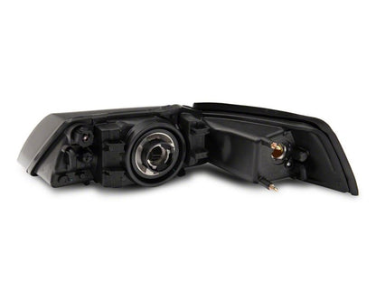 Raxiom 99-04 Ford Mustang Axial Series OEM Style Replacement Headlights- Black Housing (Smoked Lens)