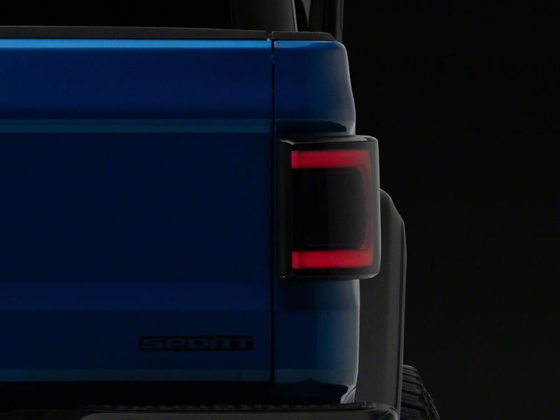 Raxiom 20-26 Jeep Gladiator JT Low Profile LED Tail Lights- Black Housing- Smoked Lens