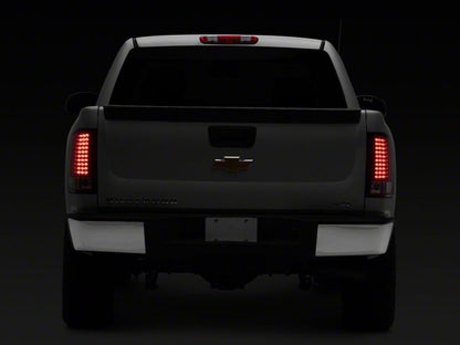 Raxiom 07-13 Chevrolet Silverado 1500 LED Tail Lights- Chrome Housing- Red/Clear Lens