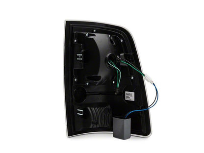 Raxiom 09-18 Dodge RAM 1500 LED Tail Lights- Black Housing- Clear Lens
