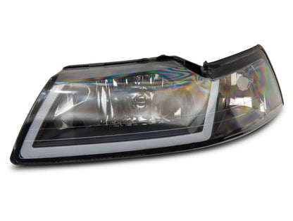 Raxiom 99-04 Ford Mustang Axial Series Headlights w/ Sequential LED Bar- Black Housing (Clear Lens)