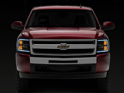 Raxiom 07-13 Chevrolet Silverado 1500 Axial Series Headlights w/ LED Bar- Black Housing (Clear Lens)
