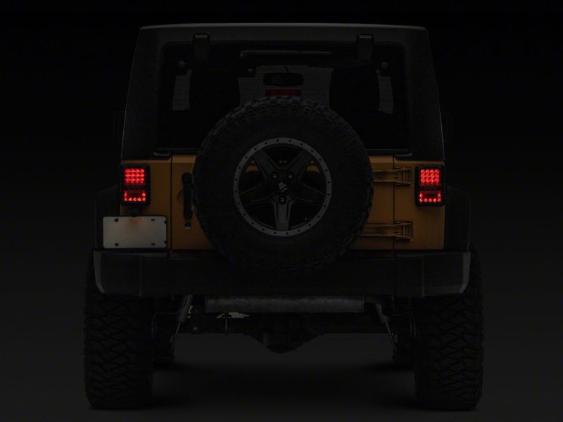 Raxiom 07-18 Jeep Wrangler JK Axial Series Lux LED Tail Lights- Blk Housing (Clear Lens)