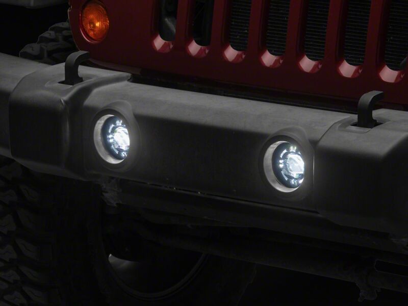 Raxiom 07-18 Jeep Wrangler JK V2 LED Switchback Fog Lights with Amber Turn Signal and Halo Rings
