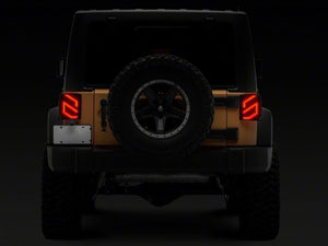 Raxiom 07-18 Jeep Wrangler JK Axial Series Trident LED Tail Lights- Blk Housing (Clear Lens)