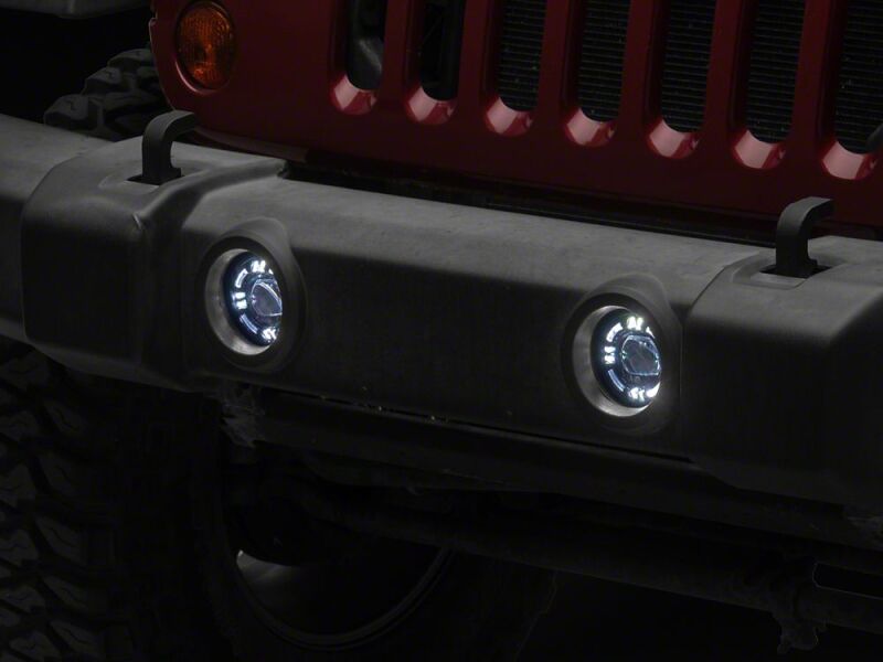 Raxiom 07-18 Jeep Wrangler JK V2 LED Switchback Fog Lights with Amber Turn Signal and Halo Rings