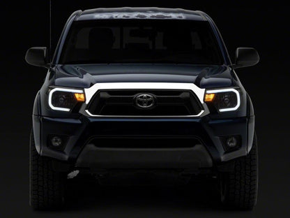 Raxiom 12-15 Toyota Tacoma Axial Series Headlights w/ LED Bar- Black Housing (Clear Lens)