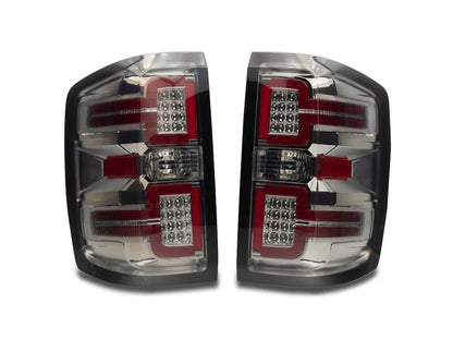 Raxiom 14-18 Chevrolet Silverado 1500 LED Tail Lights/SeqTurn Signals- Chrome- Smoked Lens