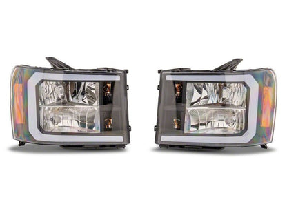Raxiom 07-13 Chevrolet Sierra 1500 Axial Series Headlights/Seq LED Bar- Black- Clear Lens