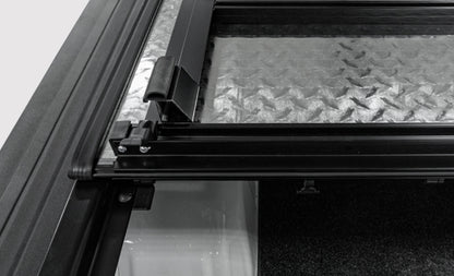Access LOMAX Tri-Fold Cover 04-14 Ford F-150 6ft 6in Bed - Carbon Fiber Finish