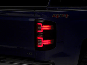 Raxiom 14-18 Chevrolet Silverado 1500 LED Taillights w/ SEQL Turn Signals- Blk Housing (Clear Lens)