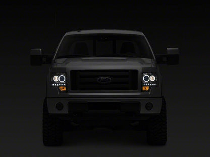 Raxiom 09-14 Ford F-150 G2 Super White LED Halo Projector Headlights- Black Housing- Clear Lens