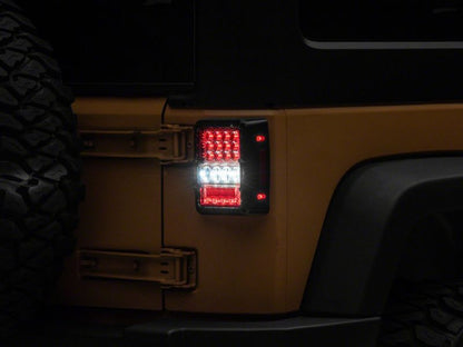 Raxiom 07-18 Jeep Wrangler JK Axial Series Lux LED Tail Lights- Black Housing (Clear Lens)