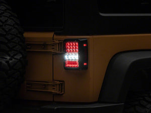 Raxiom 07-18 Jeep Wrangler JK Axial Series Lux LED Tail Lights- Blk Housing (Clear Lens)