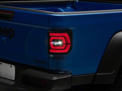 Raxiom 20-26 Jeep Gladiator JT Low Profile LED Tail Lights- Black Housing- Smoked Lens