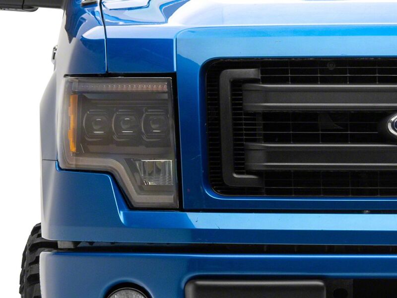 Raxiom 09-14 Ford F-150 CXR Series LED Headlights with Amber DRL- Black Housing- Clear Lens