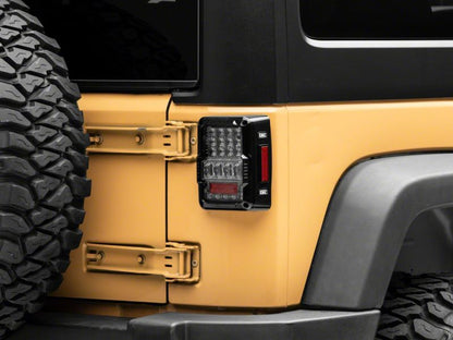 Raxiom 07-18 Jeep Wrangler JK Axial Series Lux LED Tail Lights- Black Housing (Clear Lens)