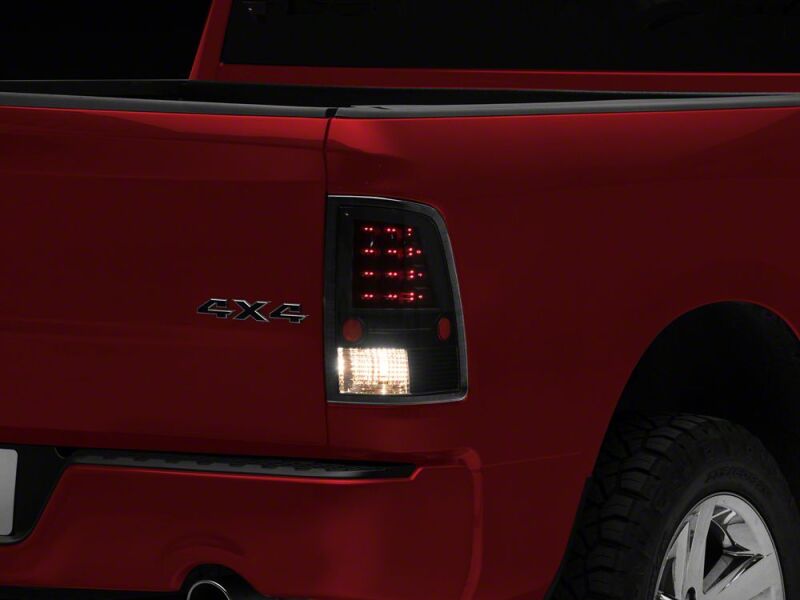 Raxiom 09-18 Dodge RAM 1500 LED Tail Lights- Black Housing- Clear Lens