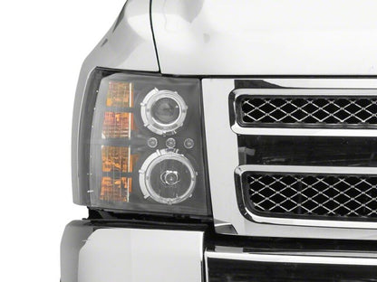 Raxiom 07-13 Chevrolet Silverado 1500 LED Halo Projector Headlights- Black Housing- Clear Lens