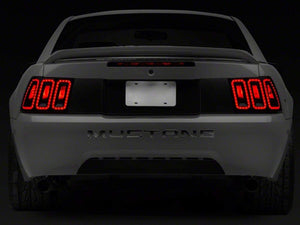 Raxiom 99-04 Ford Mustang Excluding 99-01 Cobra Icon LED Tail Lights- Black Housing (Smoked Lens)