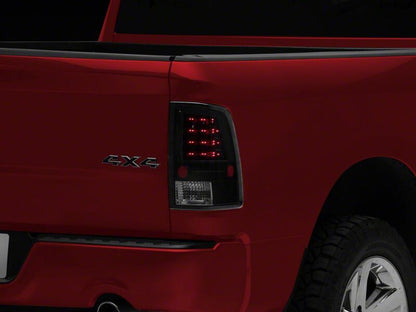 Raxiom 09-18 Dodge RAM 1500 LED Tail Lights- Black Housing- Clear Lens
