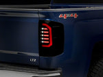 Raxiom 14-18 Chevrolet Silverado 1500 Axial Series LED Tail Lights- Blk Housing (Smoked Lens)