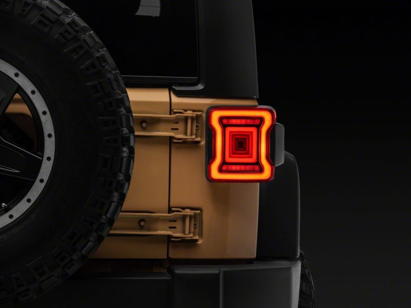 Raxiom 07-18 Jeep Wrangler JK Axial Series JL Style LED Tail Lights- BlkHousing- Red Lens