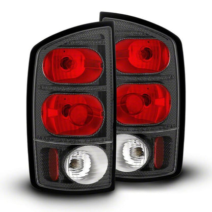 Raxiom 02-05 Dodge RAM 1500 Axial Series Tail Lights- Carbon Fiber Housing- Red/Clear Lens