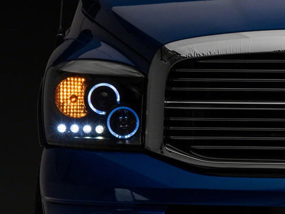 Raxiom 06-08 Dodge RAM 1500 LED Halo Projector Headlights- Black Housing (Clear Lens)