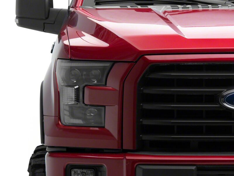 Raxiom 15-17 Ford F-150 XR Series LED Projector Headlights with DRL- Black Housing- Clear Lens
