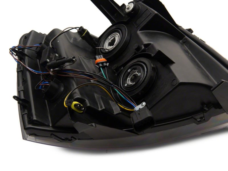 Raxiom 07-13 Chevrolet Silverado 1500 Axial Series Headlights w/ LED Bar- Black Housing (Clear Lens)