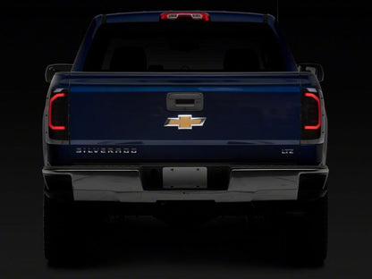 Raxiom 14-18 Chevrolet Silverado 1500 Axial Series LED Tail Lights- Black Housing (Smoked Lens)