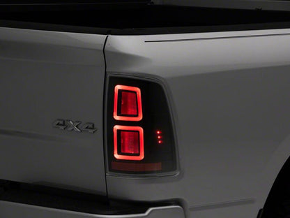 Raxiom 09-18 Dodge RAM 1500 LED Tail Lights- Black Housing- Clear Lens