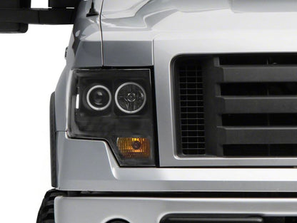 Raxiom 09-14 Ford F-150 Super White LED Halo Projector Headlights- Black Housing (Clear Lens)