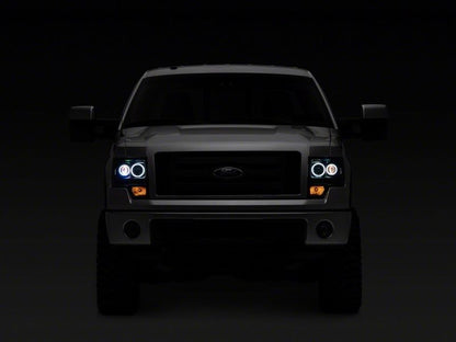 Raxiom 09-14 Ford F-150 Super White LED Halo Projector Headlights- Black Housing (Clear Lens)