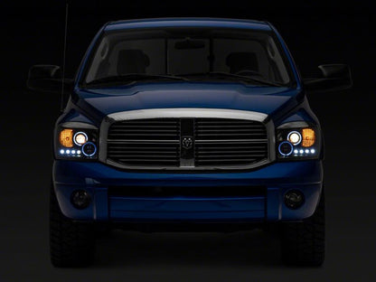 Raxiom 06-08 Dodge RAM 1500 LED Halo Projector Headlights- Black Housing (Clear Lens)