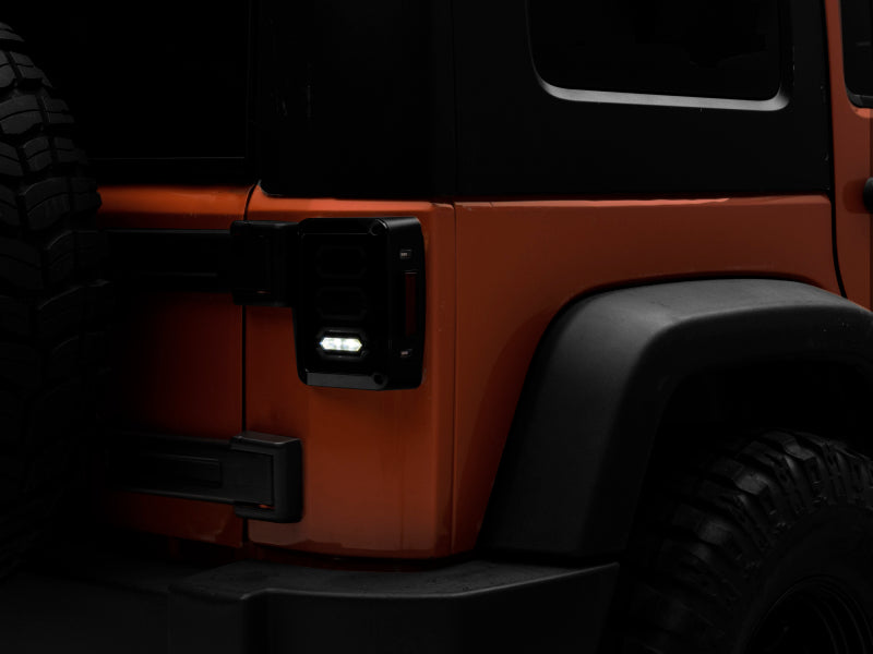 Raxiom 07-18 Jeep Wrangler JK LED Tail Lights- Black Housing (Smoked Lens)