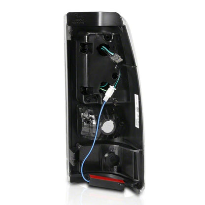 Raxiom 03-06 Chevrolet Silverado 1500 Fleetside Axial Series LED Tail Lights- Black - Clear Lens