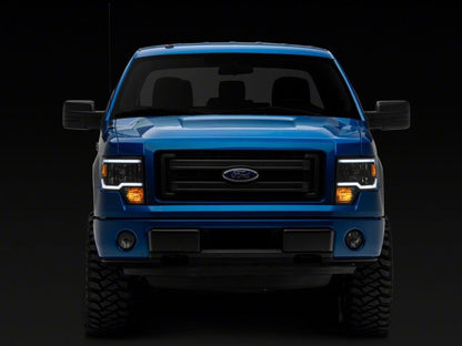 Raxiom 09-14 Ford F-150 Axial Series Headlight w/ SEQL LED Bar- Black Housing (Clear Lens)