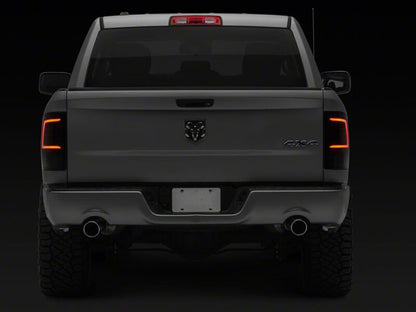 Raxiom 09-18 Dodge RAM 1500 Axial Series LED Tail Lights- Black Housing- Smoked Lens