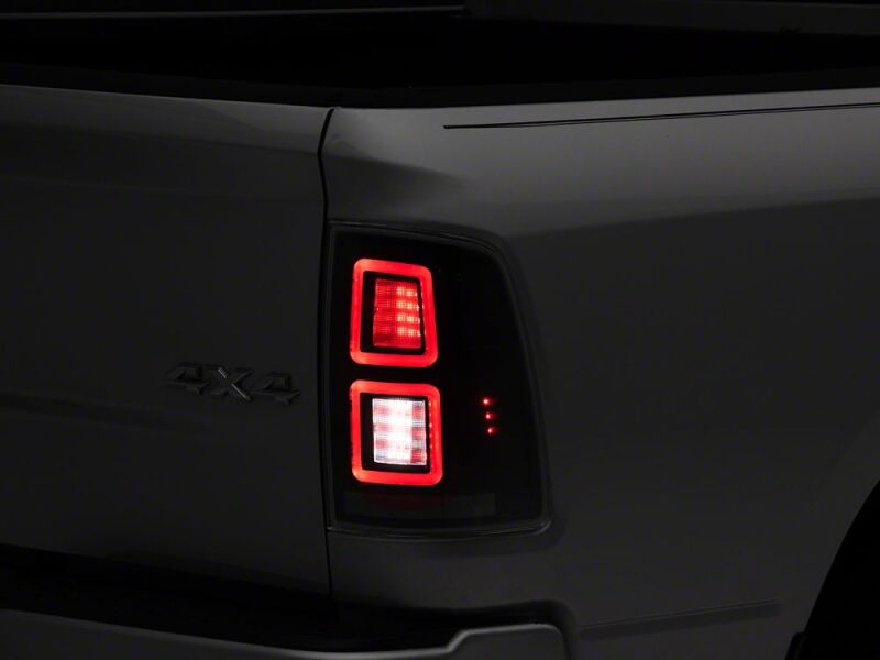 Raxiom 09-18 Dodge RAM 1500 LED Tail Lights- Black Housing- Clear Lens