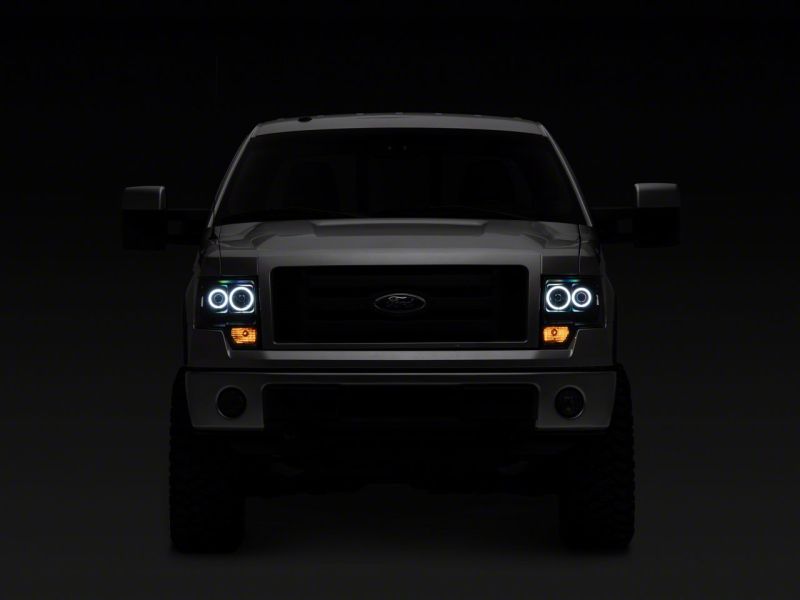 Raxiom 09-14 Ford F-150 Super White LED Halo Projector Headlights- Black Housing (Clear Lens)