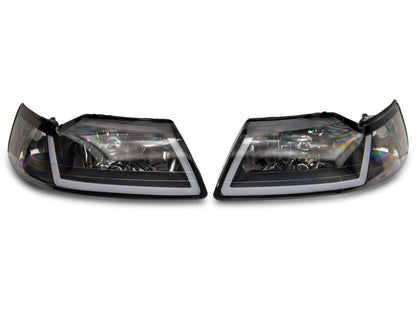 Raxiom 99-04 Ford Mustang Axial Series Headlights w/ Sequential LED Bar- Black Housing (Clear Lens)
