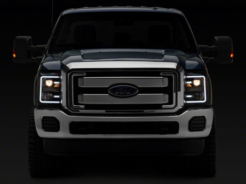 Raxiom 11-16 Ford F-250 Super Duty LED Projector Headlights - Black Housing (Clear Lens)