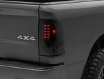 Raxiom 09-18 Dodge RAM 1500/2500/3500 Axial Series LED Tail Lights- BlkHousing- SmokedLens